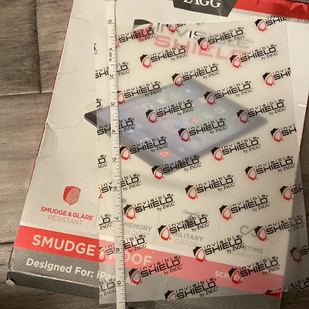 Zagg invisible shield smudge proof screen-cut to size for multiple phone uses